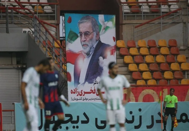 تصویر شهید فخری زاده در ورزشگاه اهواز